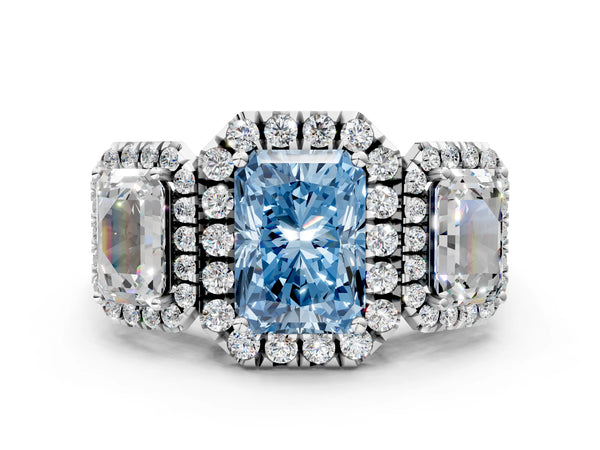 Silver Three-Stone Fancy Blue Radiant Cut Halo Diamond Ring with Pave Band and Four-Prong Setting