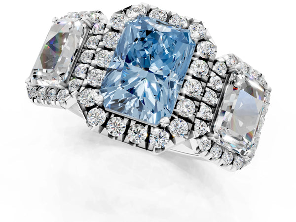 Silver Three-Stone Fancy Blue Radiant Cut Halo Diamond Ring with Pave Band and Four-Prong Setting