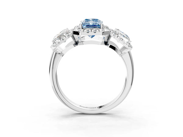 Silver Three-Stone Fancy Blue Radiant Cut Halo Diamond Ring with Pave Band and Four-Prong Setting