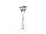 Silver Three-Stone Fancy Green Oval Cut Cut Diamond Ring with Channel Set Band and Four-Prong Setting_32