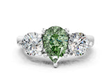 Silver Three-Stone Fancy Green Pear  Brilliant Cut Solitaire Ring with Prong Setting on a Classic Band