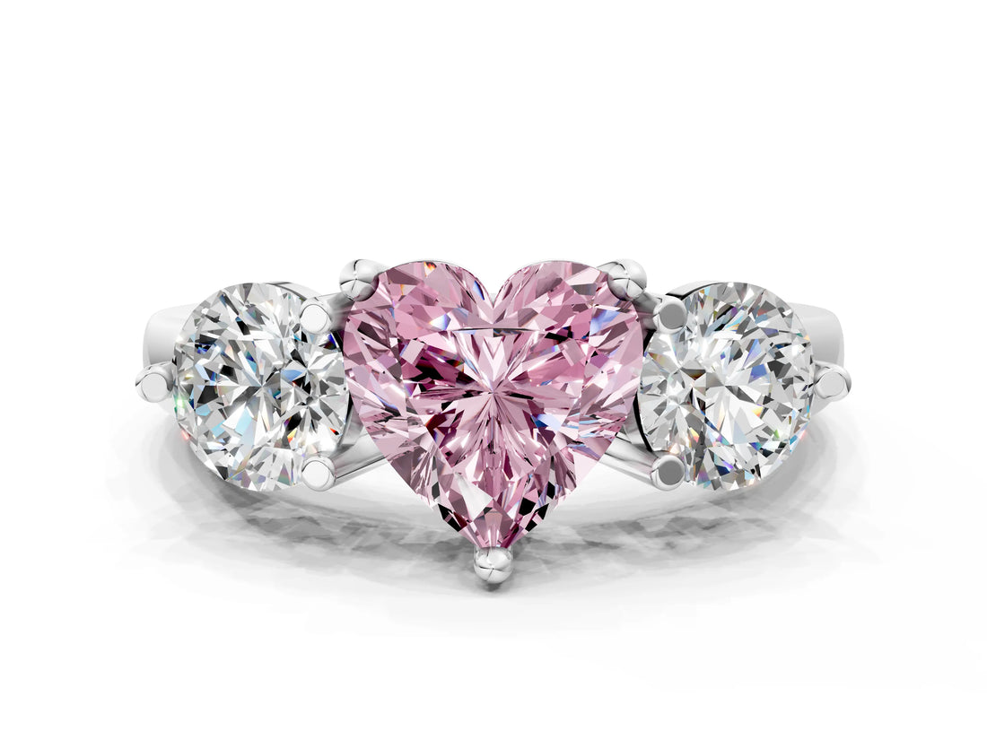 Silver Three-Stone Fancy Pink Heart  Brilliant Cut Solitaire Ring with Prong Setting on a Classic Band 1