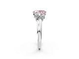 Silver Three-Stone Fancy Pink Oval Cut Cut Diamond Ring with Channel Set Band and Four-Prong Setting_26