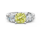 Silver Three-Stone Fancy Yellow Cushion  Brilliant Cut Solitaire Ring with Prong Setting on a Classic Band