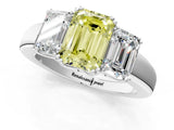 Silver Three-Stone Fancy Yellow Emerald Cut Cut Diamond Ring with Channel Set Band and Four-Prong Setting_25