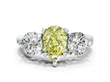 Silver Three-Stone Fancy Yellow Pear  Brilliant Cut Solitaire Ring with Prong Setting on a Classic Band 1