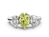 Silver Three-Stone Fancy Yellow Pear Cut Cut Diamond Ring with Channel Set Band and Four-Prong Setting_19