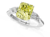 Silver Three-Stone Fancy Yellow Radiant Cut Diamond Ring with Pear  Side Stones in Four-Prong Setting_13