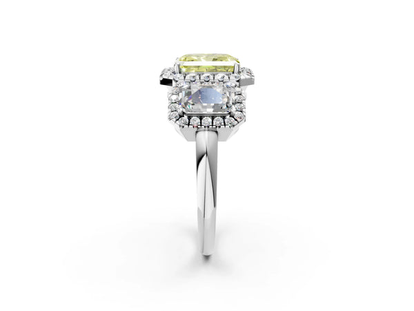 Silver Three-Stone Fancy Yellow Radiant Cut Halo Diamond Ring with Pave Band and Four-Prong Setting