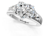 Silver Three-Stone Heart Cut Cut Diamond Ring with Trillion Side Stones on a Split Shank Band_26