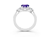 Silver Three-Stone Heart Cut Tanzanite Ring with Pear  Side Stones in Four-Prong Setting_57