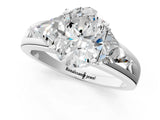 Silver Three-Stone Oval Cut Cut Diamond Ring with Trillion Side Stones on a Split Shank Band_20
