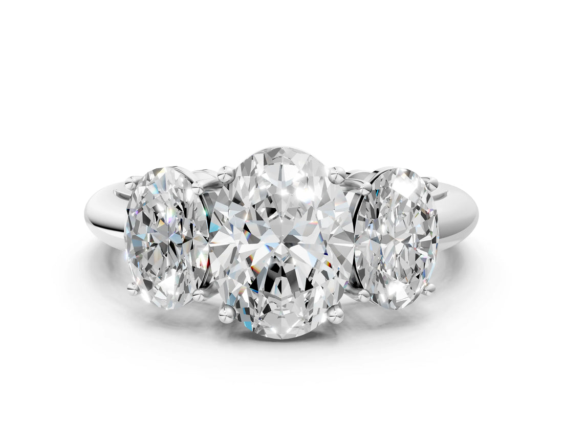 Silver Three-Stone Oval Cut Diamond Engagement Ring with Prong Setting on a Silver Band_40