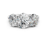 Silver Three-Stone Oval Cut Diamond Ring with Channel Set Band and Four-Prong Setting_26