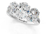 Silver Three-Stone Oval Cut Diamond Ring with Channel Set Band and Four-Prong Setting_27