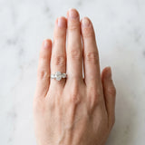 Silver Three-Stone Oval Diamond Ring with Round Side Stones, Classic Band, and Four-Prong Setting_57