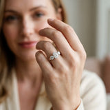 Silver Three-Stone Oval Diamond Ring with Round Side Stones, Classic Band, and Four-Prong Setting_59