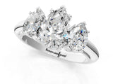 Silver Three-Stone Pear Cut Diamond Engagement Ring with Prong Setting on a Silver Band_27