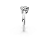 Silver Three-Stone Pear Cut Diamond Engagement Ring with Prong Setting on a Silver Band_48