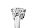 Silver Three-Stone Pear Cut Diamond Engagement Ring with Prong Setting on a Silver Band_51