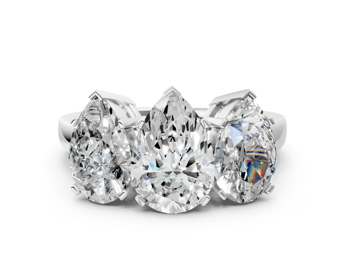 Silver Three-Stone Pear Cut Diamond Ring with Channel Set Band and Four-Prong Setting_18