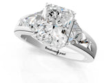 Silver Three-Stone Radiant Cut Cut Diamond Ring with Trillion Side Stones on a Split Shank Band_26