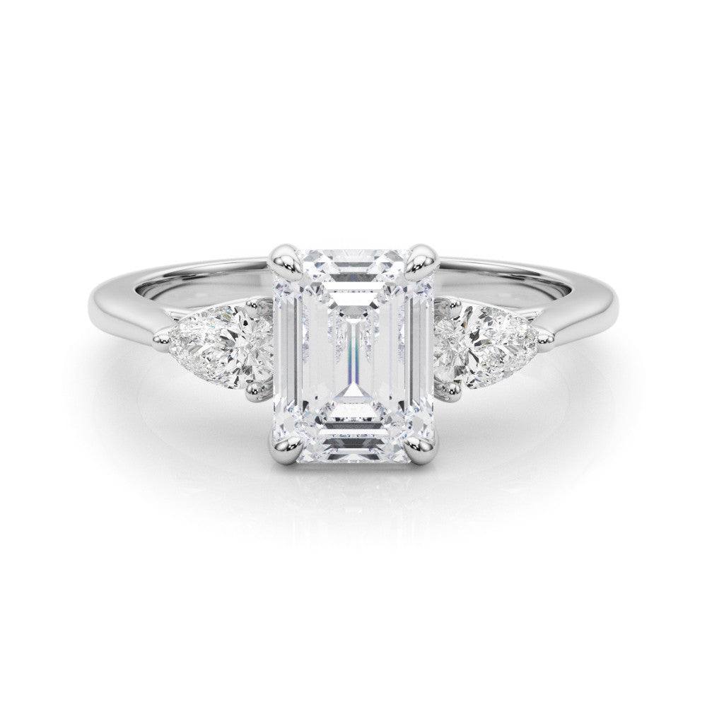 Silver Three-Stone Radiant Cut Diamond Ring with Pear Side Stones on a Platinum Band and Four-Prong Setting 2