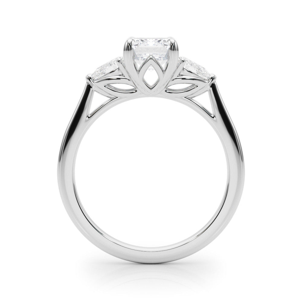 Silver Three-Stone Radiant Cut Diamond Ring with Pear Side Stones on a Platinum Band and Four-Prong Setting