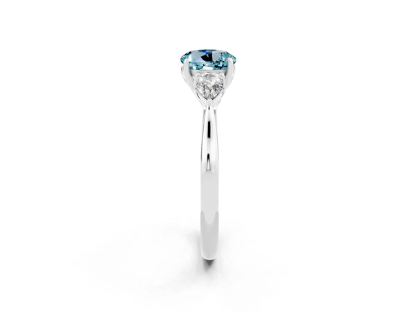 Silver Three-Stone Round Cut Aquamarine Ring with Pear  Side Stones in Four-Prong Setting