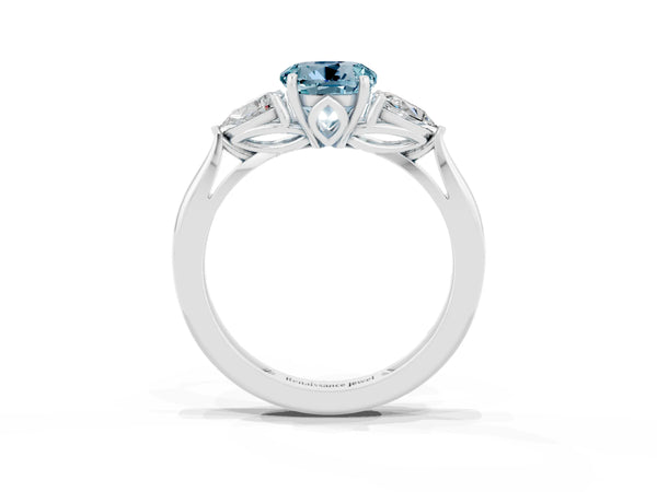 Silver Three-Stone Round Cut Aquamarine Ring with Pear  Side Stones in Four-Prong Setting