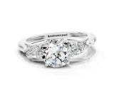 Silver Three-Stone Round Cut Moissanite Ring with Pear  Side Stones in Four-Prong Setting_54