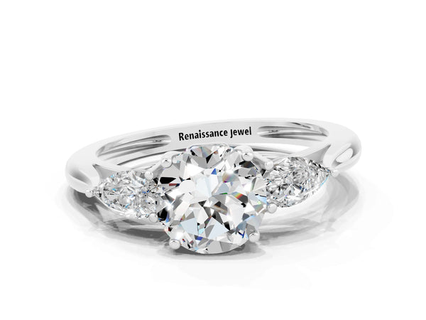 Silver Three-Stone Round Cut Moissanite Ring with Pear  Side Stones in Four-Prong Setting