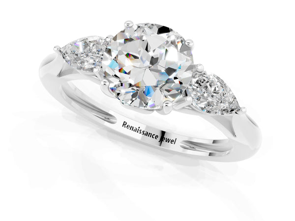 Silver Three-Stone Round Cut Moissanite Ring with Pear  Side Stones in Four-Prong Setting
