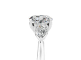 Silver Three-Stone Round Cut Moissanite Ring with Pear  Side Stones in Four-Prong Setting_59