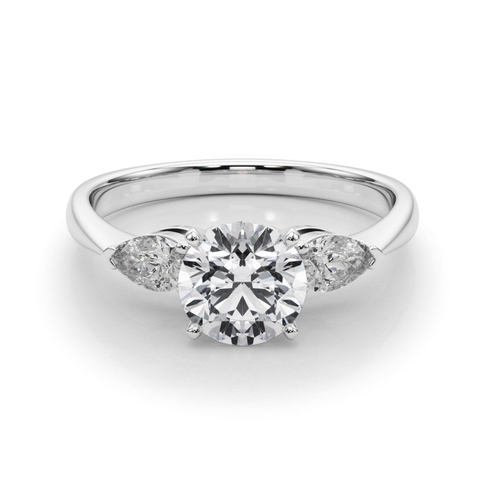Silver Three-Stone Round Diamond Ring with Pear Side Stones on a Platinum Band with Four-Prong Setting