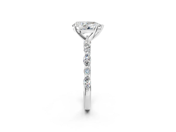5 Carat Pear Cut White gold Diamond Ring with Marquise and Round Side Stones and Four-Prong Setting