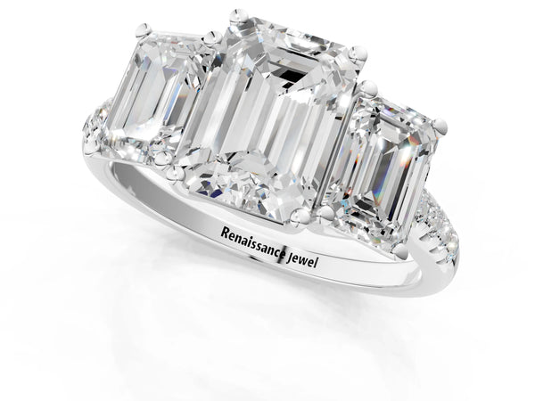 White gold 5 Carat Three-Stone Emerald Cut Diamond Ring with Round  Pavé Band and Prong Setting