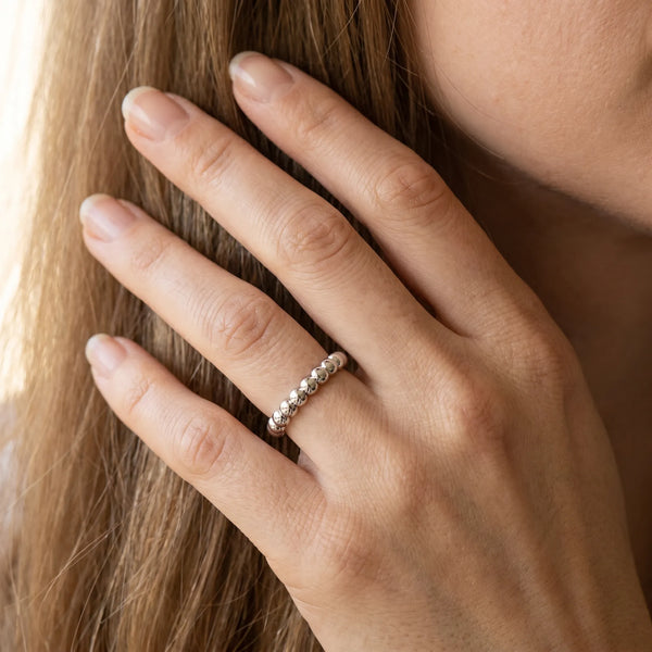 White gold Beaded Round Stone Eternity Band with Bezel Setting