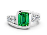 White gold Bezel Set Emerald Cut Diamond Split Shank Ring