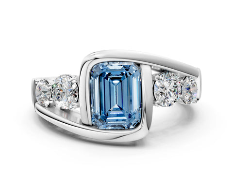White gold Bezel Set Fancy Blue Emerald Cut Diamond Split Shank Ring