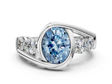 White gold Bezel Set Fancy Blue Oval Cut Diamond Split Shank Ring