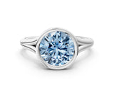White gold Bezel Set Fancy Blue Round  Cut Solitaire Ring with Tapered Band