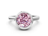 White gold Bezel Set Fancy Pink Round Cut Solitaire Engagement Ring with Classic Band
