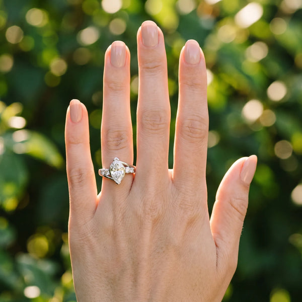 White gold Bezel Set Marquise Diamond Split Shank Ring