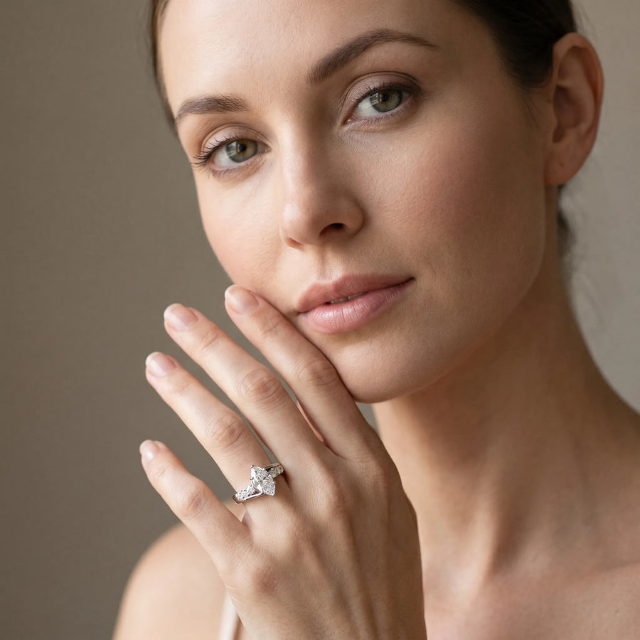White gold Bezel Set Marquise Diamond Split Shank Ring