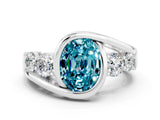White gold Bezel Set Oval Cut Diamond Split Shank Ring