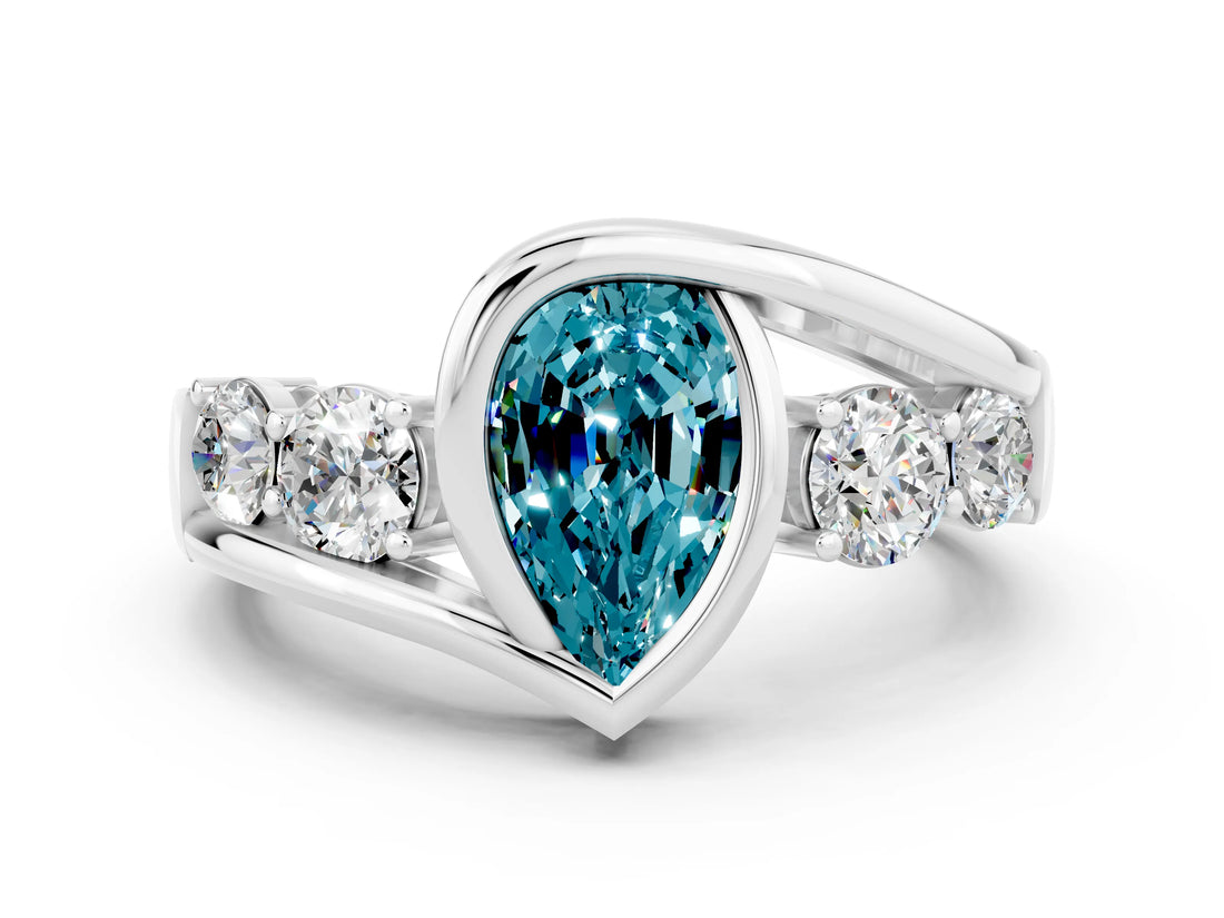 White gold Bezel Set Pear Cut Diamond Split Shank Ring