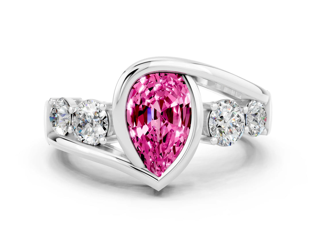 White gold Bezel Set Pear Cut Diamond Split Shank Ring