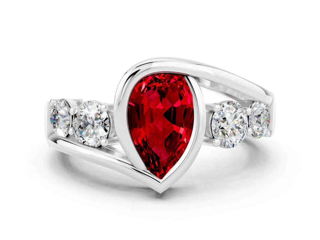 White gold Bezel Set Pear Cut Diamond Split Shank Ring