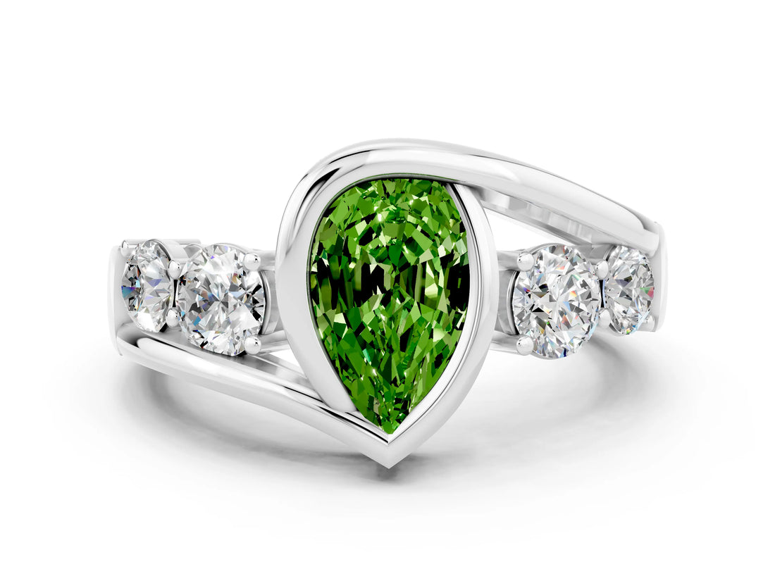 White gold Bezel Set Pear Cut Diamond Split Shank Ring